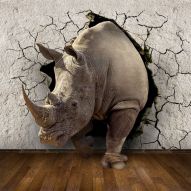 Фотообои 3D носорог выходит из стены